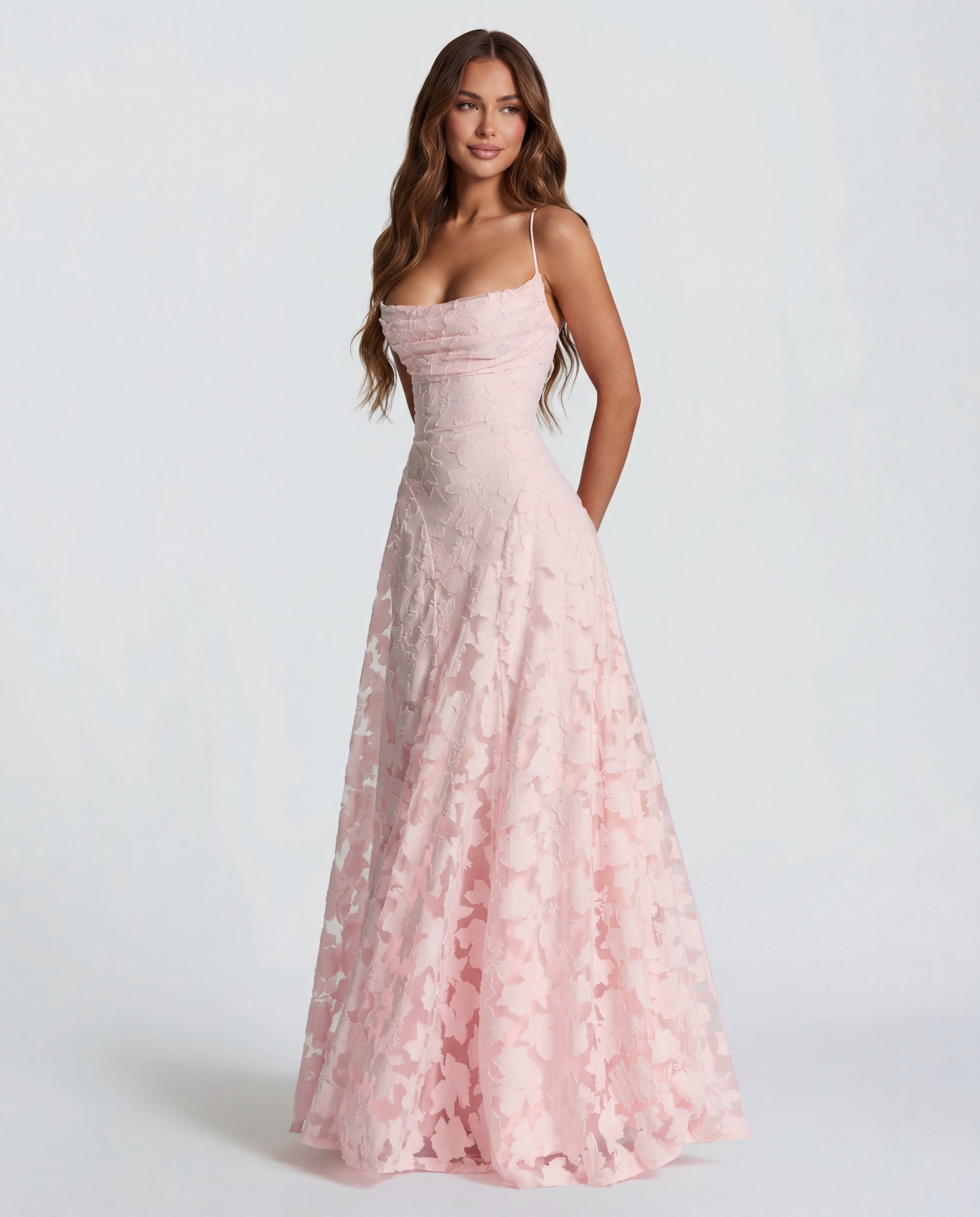 Floral maxi dress with adjustable straps and a flowing skirt in elegant lace design, perfect for women, showcased in a soft pastel pink color. 0